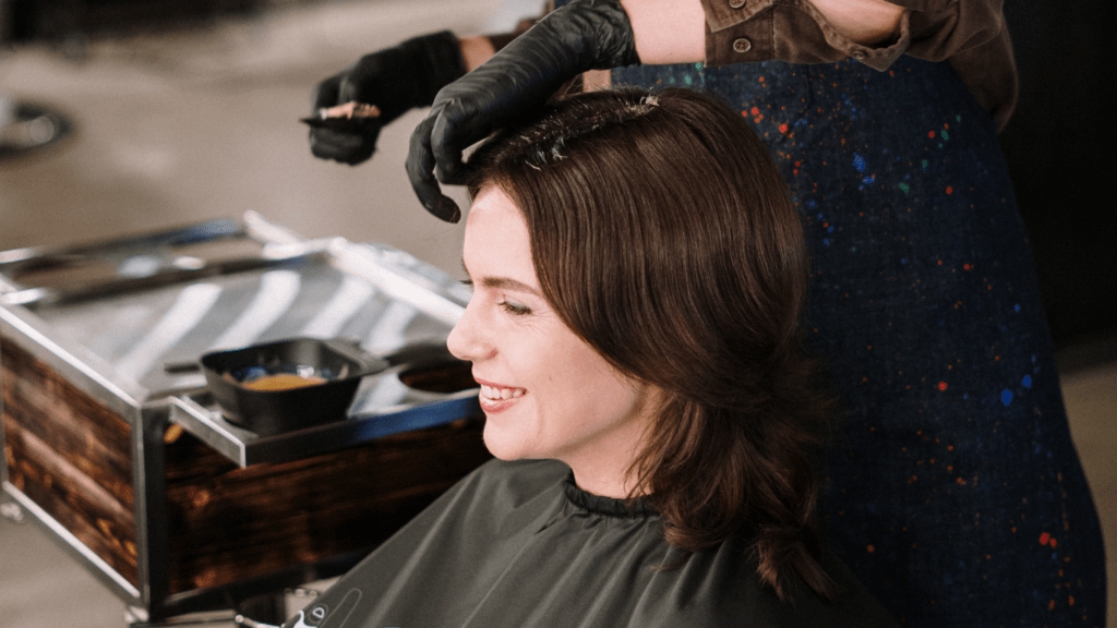 woman getting hair salon