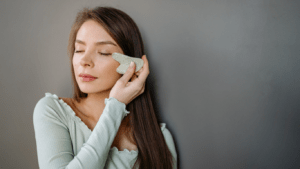 Woman using Gua sha